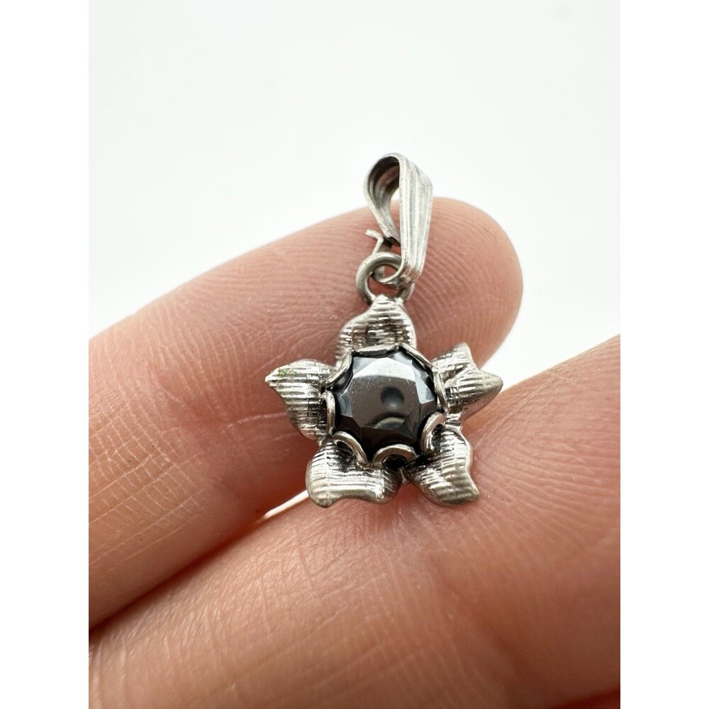 Zeidell’s Sterling Silver Hematite Pendant Delicate Flower
